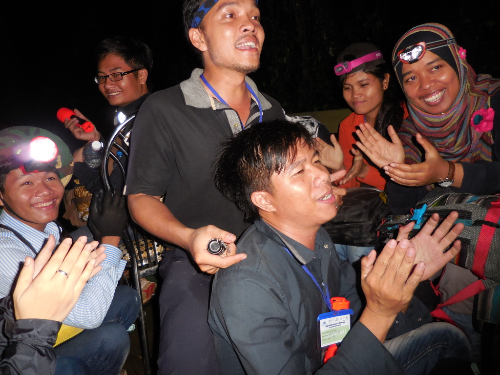 Studying bats and making friends and of course, because we are in southern Vietnam, singing!